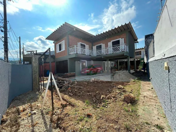 Casa, 280 m² - venda por R$ 1.400.000,00 ou aluguel por R$ 9.000,00/mês - Centro - Caragua
