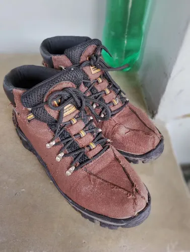 Bota cat masculino