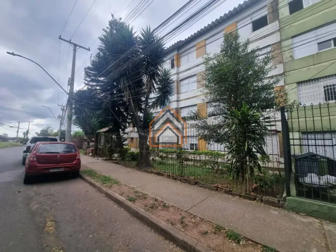 Apartamento com 2 dormitórios para alugar, 60 m² por R$ 1.667,00/mês - Rubem Berta - Porto