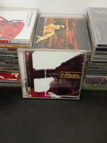 Gizmach, The Imbuing cd importado, produzido pelo Shawn do slipknot 
