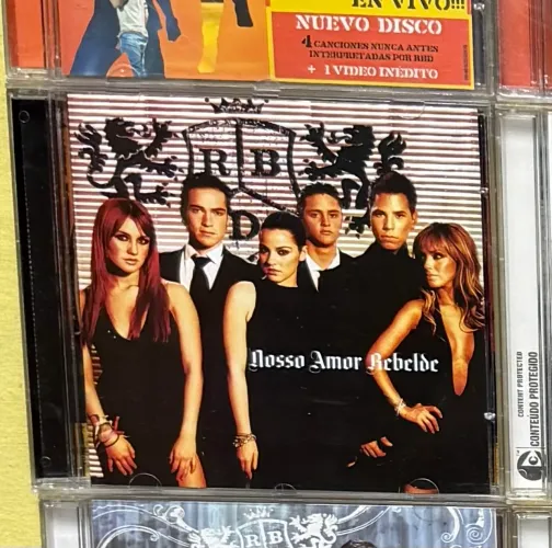 CD NOSSO AMOR REBELDE - RBD (RELANÇAMENTO)