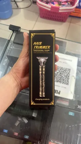 Máquina de cortar cabelo portátil