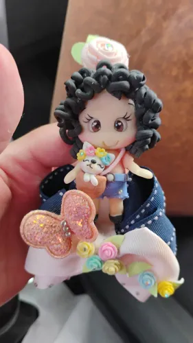 Tiara com Laço e Boneca Fofa