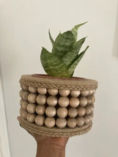 Vaso decorativo com espada de São Jorge