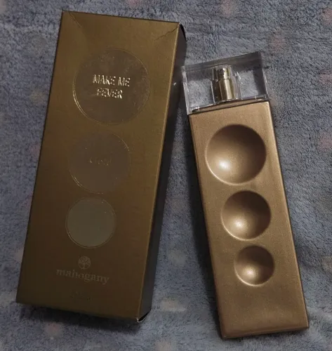 FRAGRÂNCIA DESODORANTE CORPORAL<br>MAKE ME FEVER GOLD 100ML