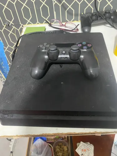 Vendo ps4 1250 com fifa 26 e Call Of Duty ou troco por iPhone 12 ou 13 normal ou pro Max