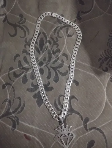 Vendo volta escama de peixe completa com tranca pega ladrão e pingente