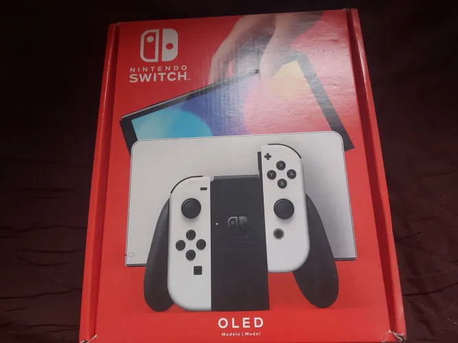 Nintendo switch OLED desbloqueado 128 gigas com caixa e acessórios só faltando o cabo hdmi