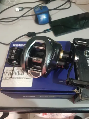 carretilha de pesca marca seasir cast x mão direita nova na caixa