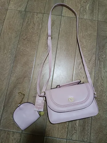 Bolsa rosa nova com porta moedas