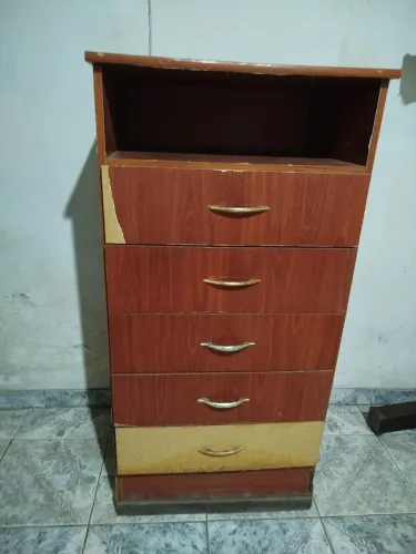 CÔMODA precisando eenvelopar