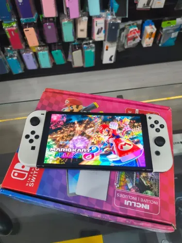 Nintendo Switch Oled Usado - com jogos na memória