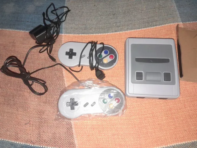 Super mini sfc (nintendinho) 620 jogos.