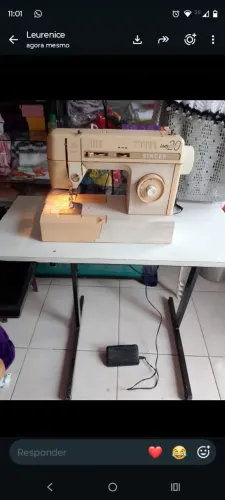 Máquina de costura Singer.Vender logo
