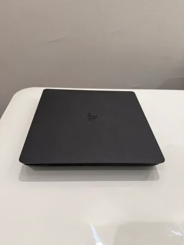 PlayStation 4 Slim 1tb + 2 controles + caixa oficial