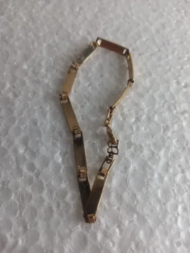 PULSEIRA ROMANNEL USADA PULSEIRA DOURADA
