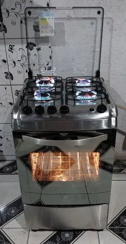 Lindo moderno fogão eletroux inox espelhado com superchama automático com prateleira 