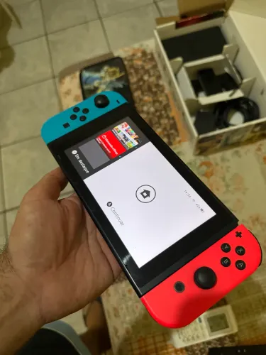 Nintendo Switch Destravado + cartão de memória de 128gb cheio de jogos
