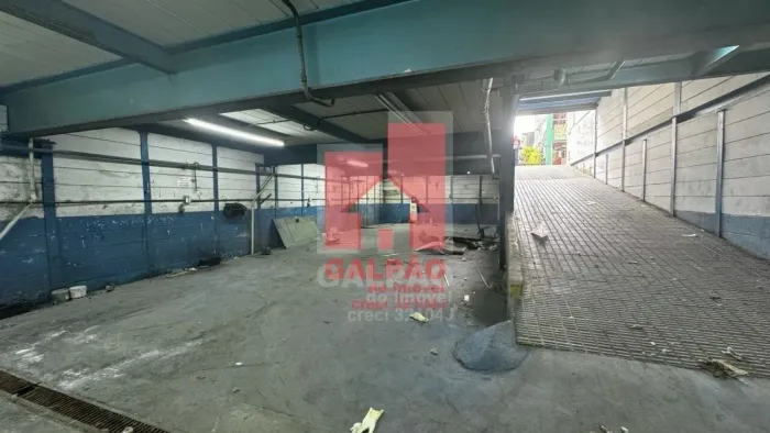 Moema, loja tipo galpão, com mezanino e 2 vagas frontais, mais subsolo, rua de grande movi