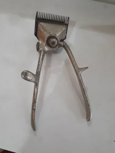 Relíquia máquina manual de cortar cabelo
