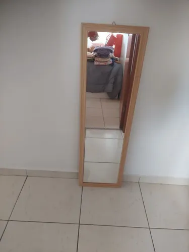 Espelho  com modura  de madeira 