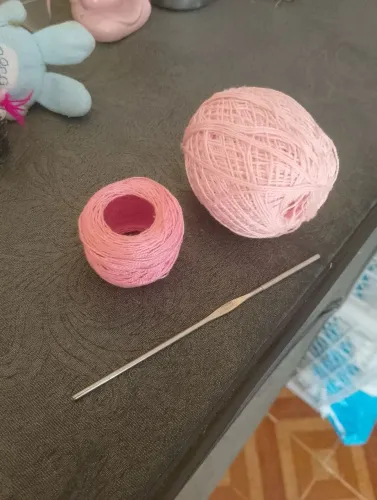 Agulha de tricô e linha
