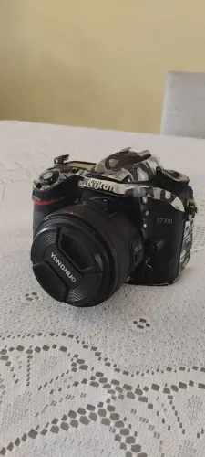 Câmera Nikon D7100 + lente