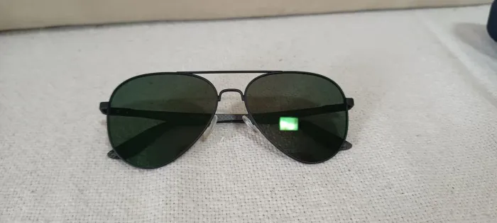 Óculos de sol Julius modelo aviador. Óculos novo.
