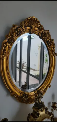 Espelho oval classico dourado