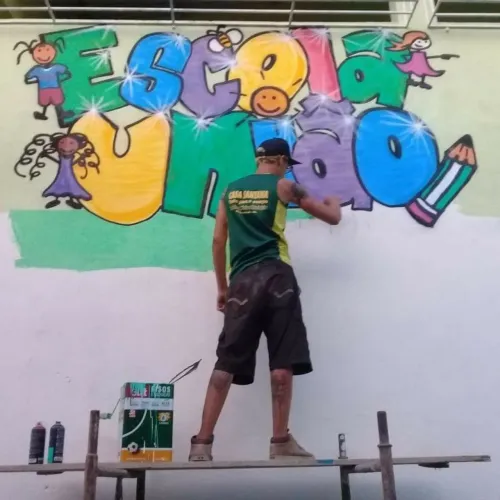 Grafite comercial, logomarca, faixada e acesso por cordas