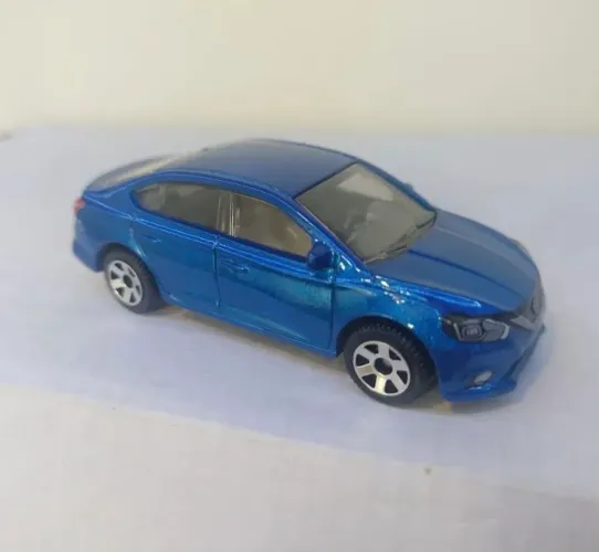 Miniatura Matchbox Nissan Sentra Azul Novo Loose 1:64