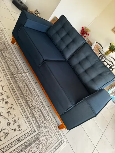Sofá três lugares 