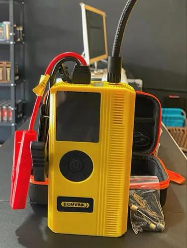 Auxiliar de partida e compressor de ar