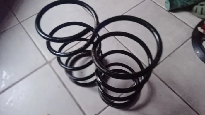 par molas dianteira automotiva Kia Clarus