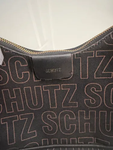 Bolsa Schutz transversa