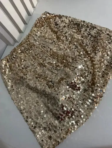Saia paitê dourada