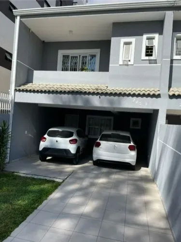 Sobrado com 3 dormitórios à venda, 181 m² por R$ 835.000 - Novo Mundo - Curitiba/PR