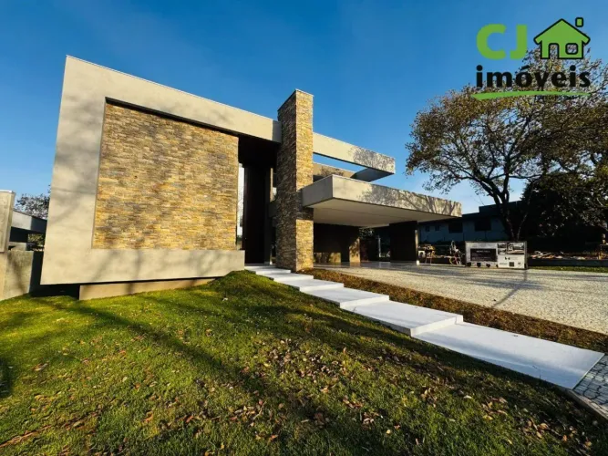 Casa com 4 dormitórios à venda, 425 m² por R$ 5.100.000,00 - Condomínio Vitória Golf - Lag
