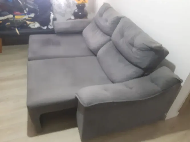 Sofá de canto cinza confortável