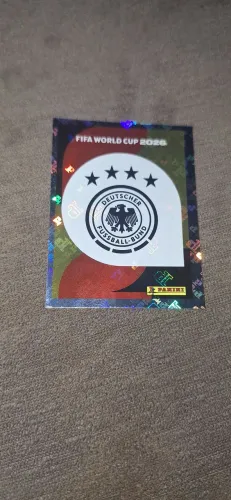 Figurinha Brilhante Escudo Alemanha Álbum Copa 2026