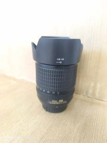 lente nikon 18.135