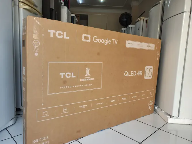 Smart TV 65 4K bordo ultrafina seminova com 6 meses de garantia.
