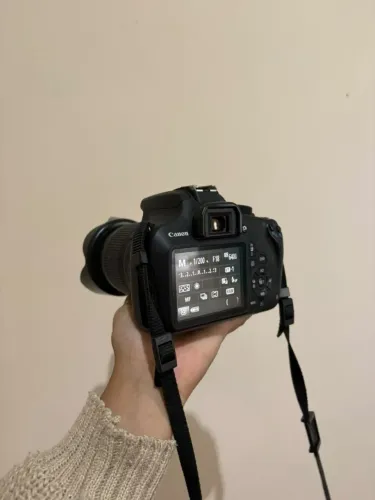 Maquina fotográfica canon.