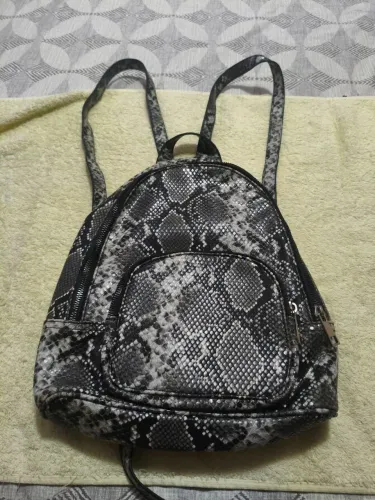 Bolsa de costas couro de cobra.