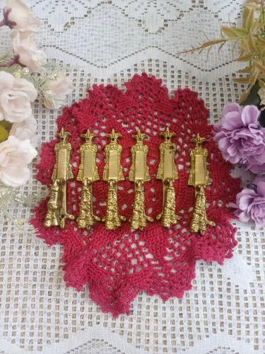 Conjunto de puxadores antigos em bronze