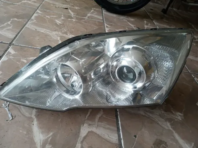 Farol Esquerdo Honda Crv 2010 ( Pé quebrado)