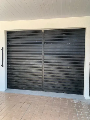 Porta de enrolar de aço - segurança para sua casa