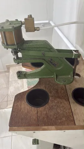 Máquina de botão
