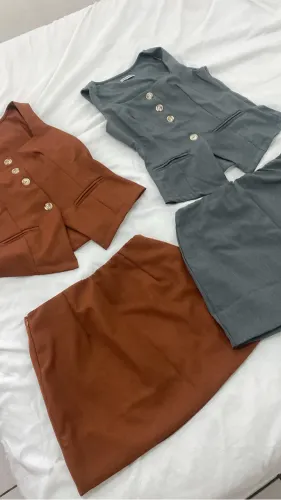 Conjunto em alfaiataria colete com saia !