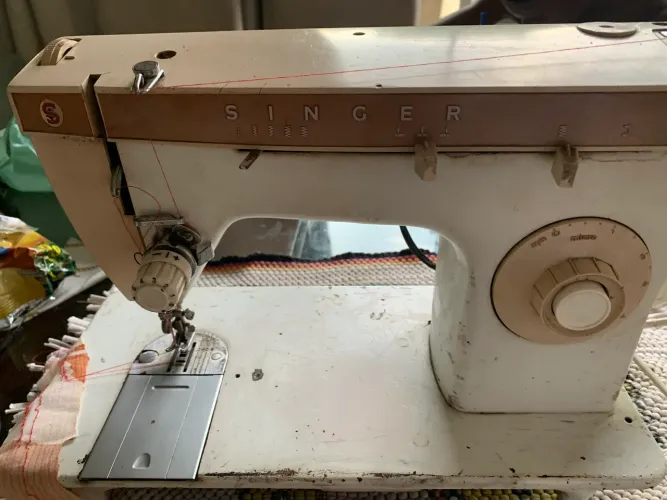 Máquina singer 247 usada tem que mexer nos pontos